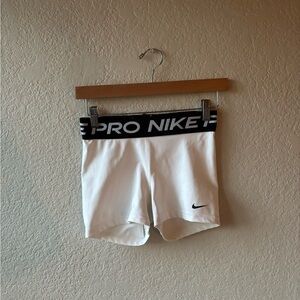 White and black Nike pros